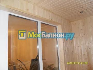Отделка балконов деревянной вагонкой в Москве