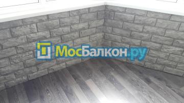 Комбинированная обшивка искусственным камнем 